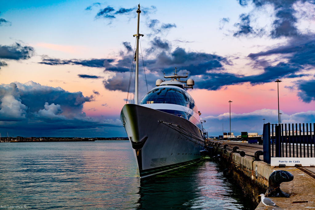 a superyacht at sunset