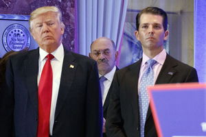 Allen Weisselberg, flanked by Donald Trump and Donald Trump Jr.