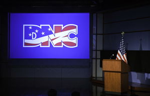 American flag in front of a DNC brand image