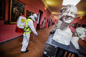 A worker sprays disinfectant at the Maschio Angioino medieval castle, in Naples, Italy, this week.